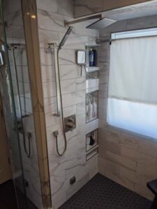 Castle Pines Kevin Petis shower tiles and nitch